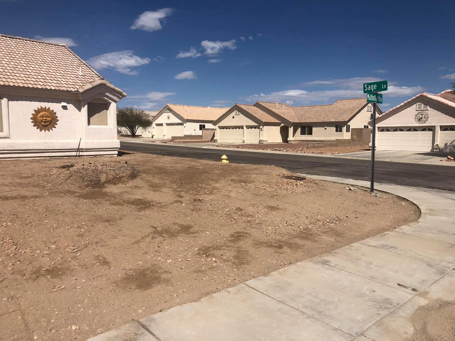 A row of houses are lined up next to each other in a residential area.