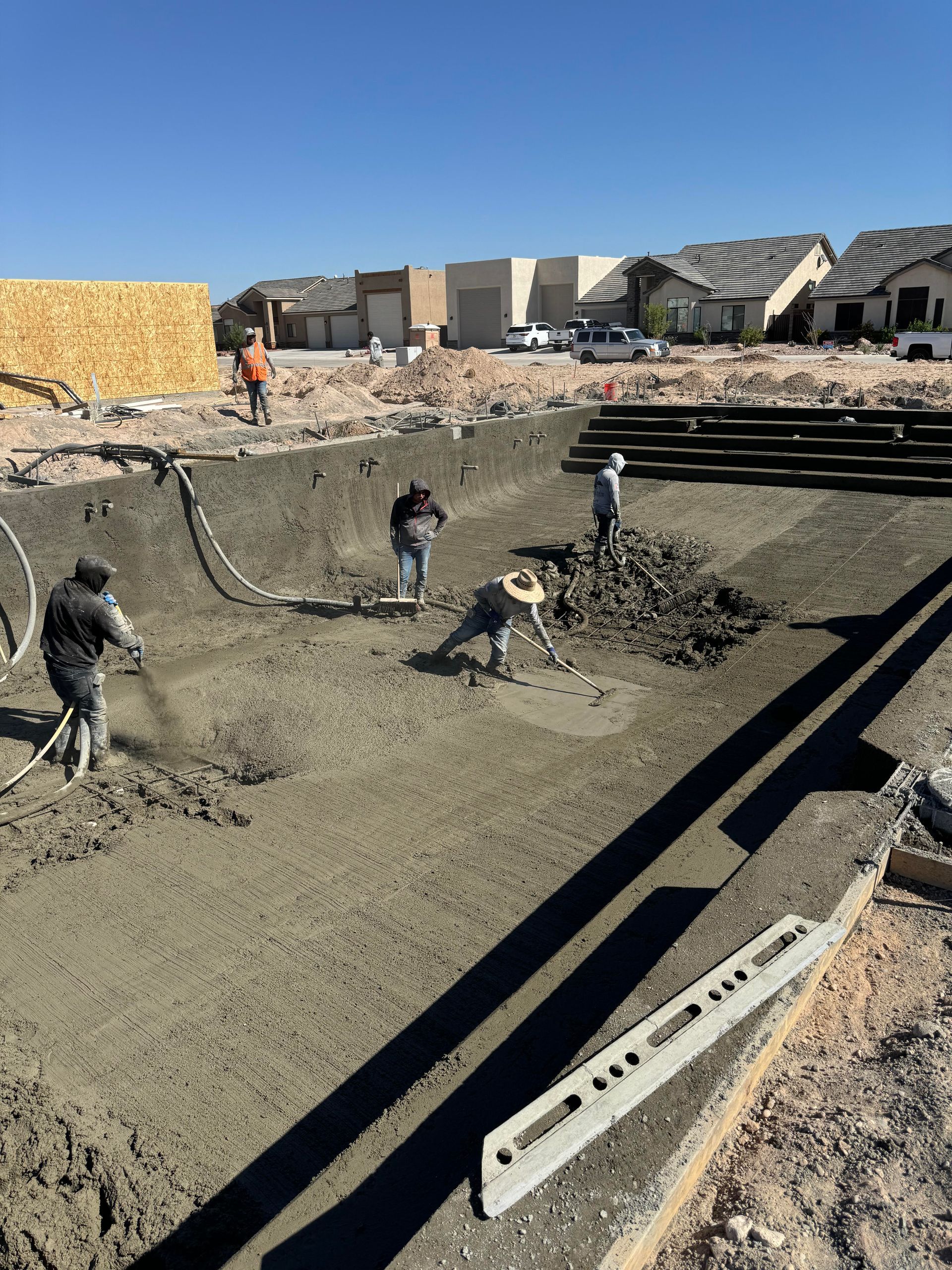 A group of people are working on a construction site.