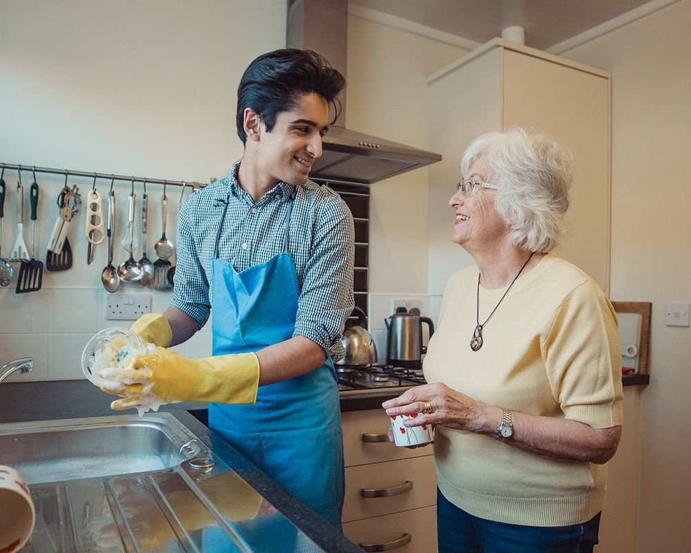 Health Care Worker Talking to Elderly While Cleaning — Semmes, AL — My Happy Seniors