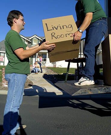 Movers with box — Affordable Moving Company in Peoria, AZ