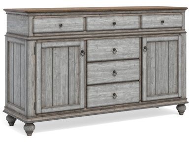 A white wooden dresser with drawers and doors on a white background.