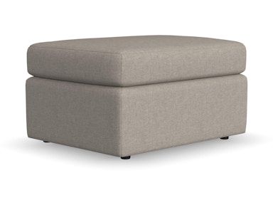 A beige ottoman with black legs on a white background.