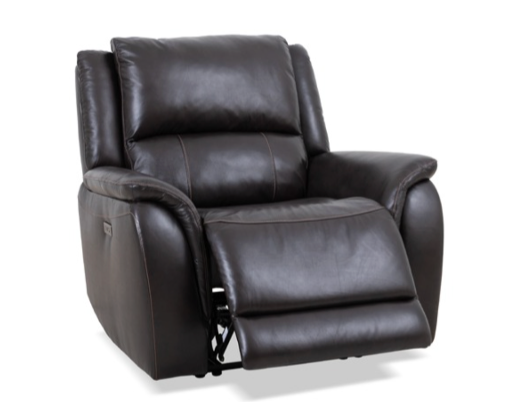 A brown leather recliner is sitting on a white surface.