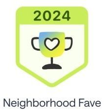 A trophy with a heart on it and the year 2024 on it.