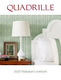 Quadrille 2020 Wallpaper Lookbook cover. Bedroom scene with lamp, framed picture, and textured green wallpaper.