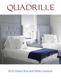 Quadrille catalog cover: Blue and white bedroom with two twin beds, fringed blanket.