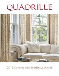 Quadrille 2019 curtains and shades lookbook cover. Curtains frame a window and a cream-colored couch.