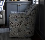Swivel armchair with gray and blue patterned upholstery.