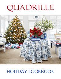 Quadrille Holiday Lookbook cover: Festive Christmas tree, blue and white decor, table with floral arrangement.