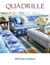 Quadrille 2020 ikat lookbook cover: blue sofas, striped rug, white ottoman, and flowers.