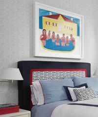 Bed with a colorful headboard and a painting of people in a pool.