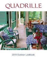Quadrille 2019 outdoor lookbook cover: Green porch with blue patterned cushions, chairs, and shutters.