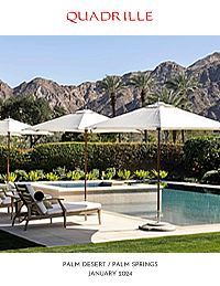 Poolside scene with white umbrellas, lounge chairs, and mountain backdrop; 