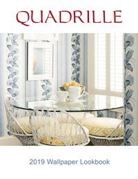 Quadrille 2019 Wallpaper Lookbook cover.  Dining room with patterned wallpaper, glass table, and chairs.