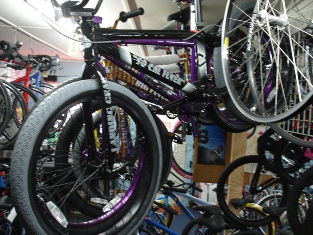 A purple bicycle with the word socal on it