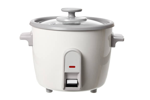 A white rice cooker with a lid on a white background