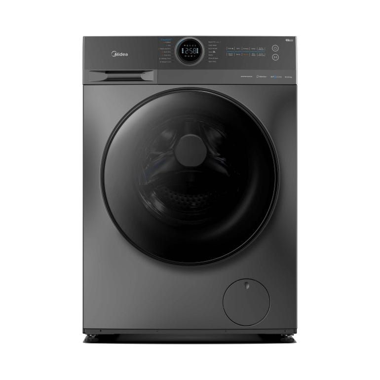 A black washing machine is sitting on a white surface.