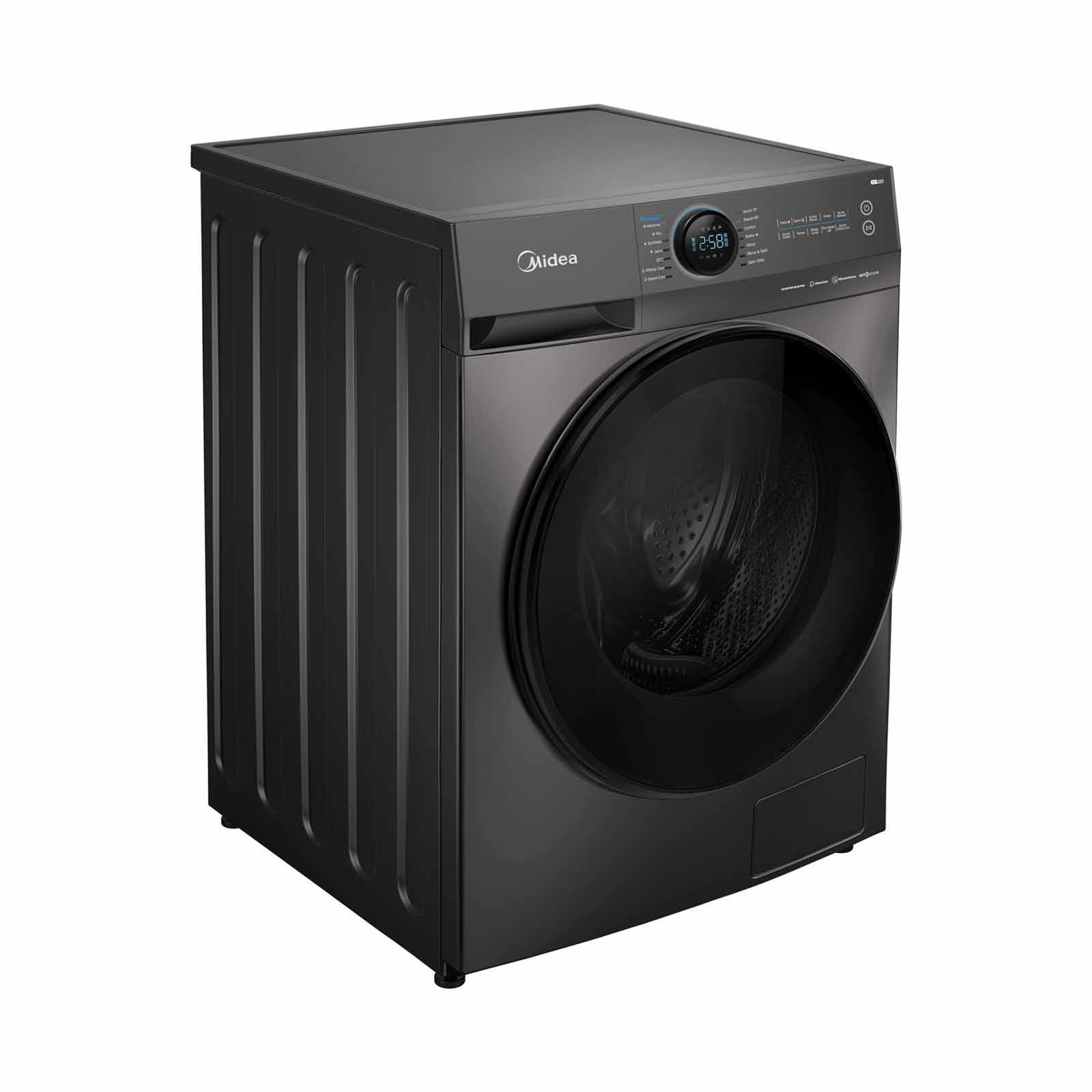 A black washing machine is sitting on a white surface.