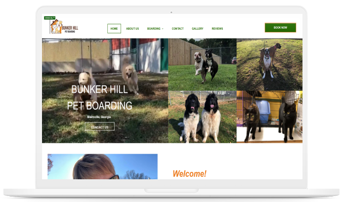 A laptop screen shows a website for bunker hill pet boarding