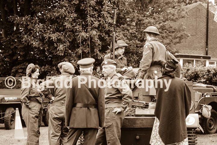 Soldiers sitting on a tank