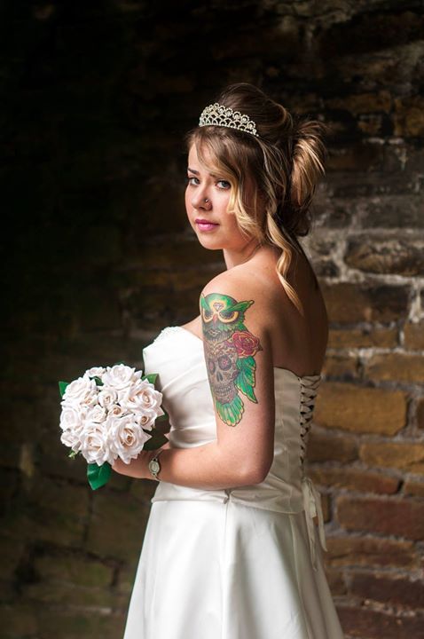 Wedding photography - bride holding flowers