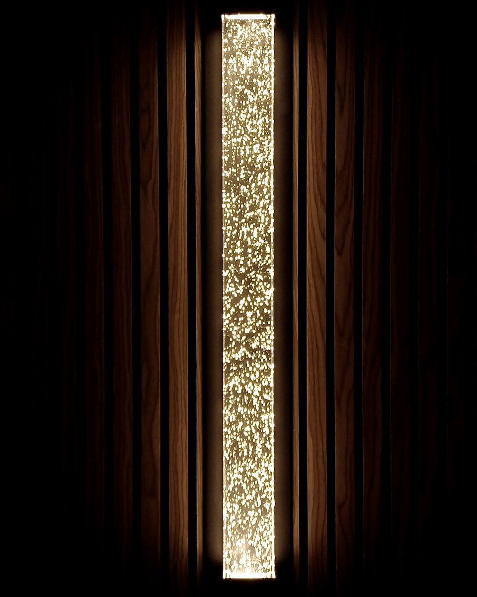 Tall Glowing Vertical Slit of Light Framed by Dark Panels — Green Valley Electrical in Ballina, NSW