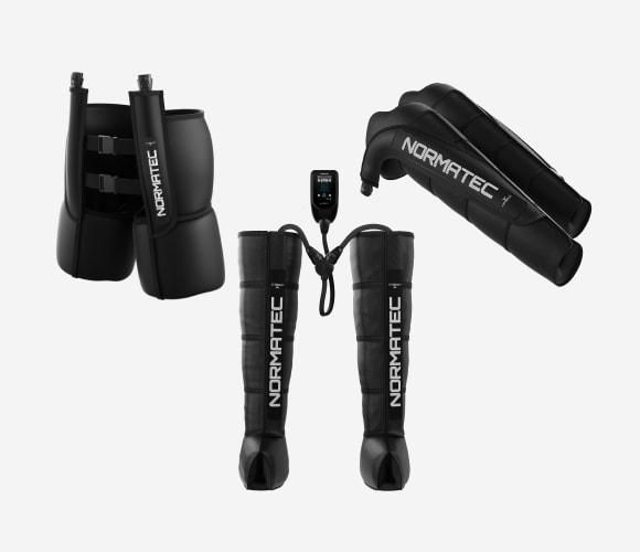 A Pair of Black Normatec Leg Wraps on A White Background — Illawarra Sports Injury Rehabilitation and Physiotherapy Centre in Bellambi, NSW