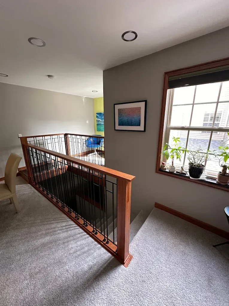 There is a staircase leading up to the second floor of a house.