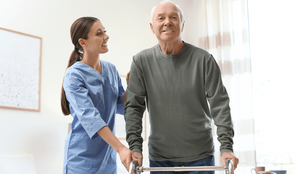 senior man with crutches with nurse