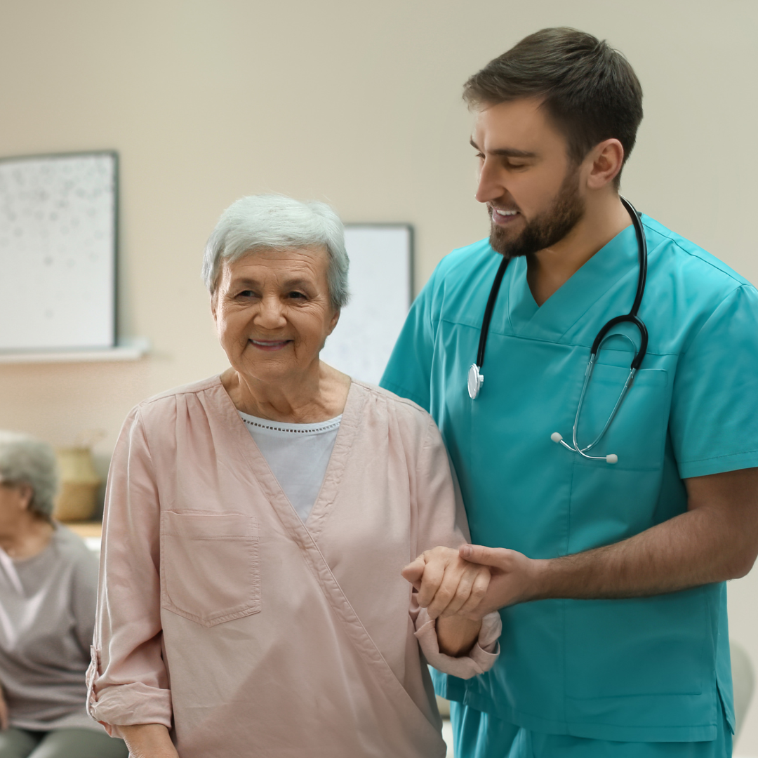 male nurse with senior woman