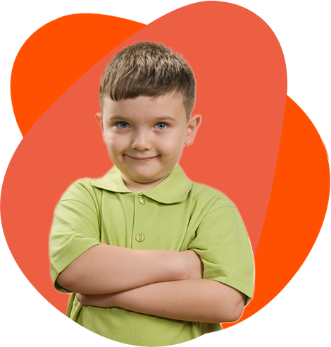 Boy with arms crossed, smiling. He's wearing a green polo shirt against an orange background. Boy with arms crossed, smiling. He's wearing a green polo shirt against an orange background.