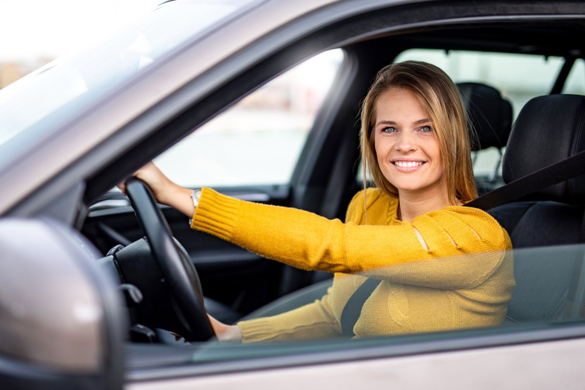 A woman with auto insurance driving in Walterboro, SC