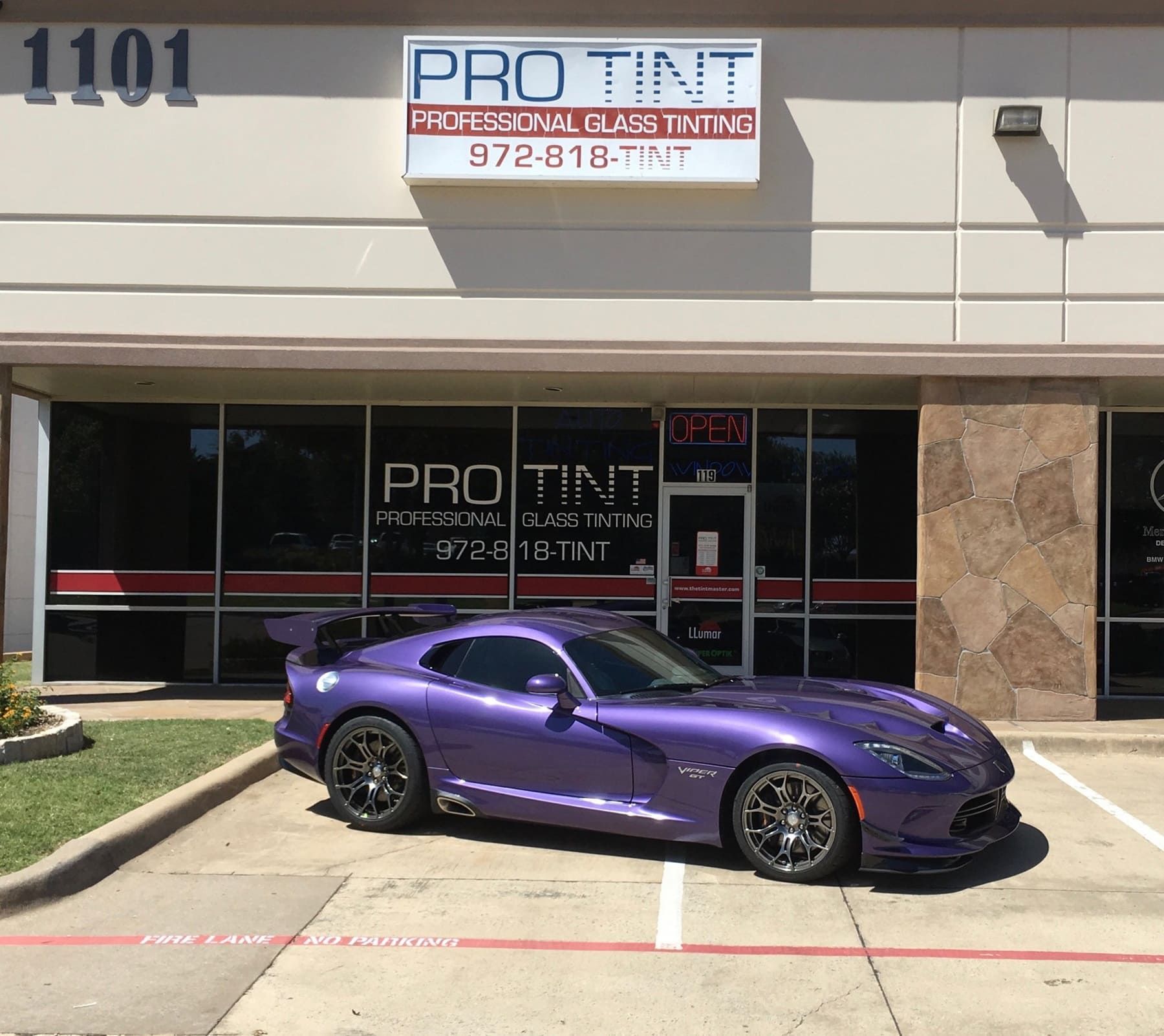 car with windows tinting in front of Pro Tint shop in Plano