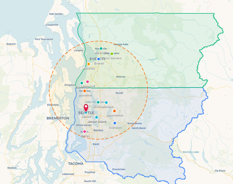 Map with green and blue outlined regions, a red location pin, and a dashed orange radius circle.