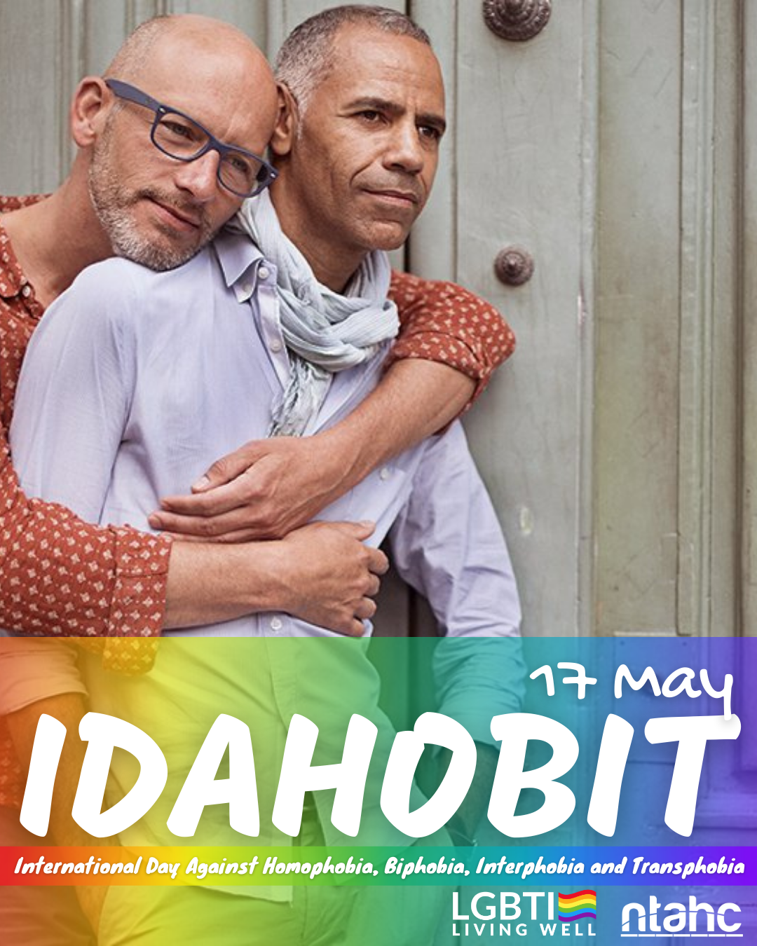 A poster for idahobit with two men hugging each other