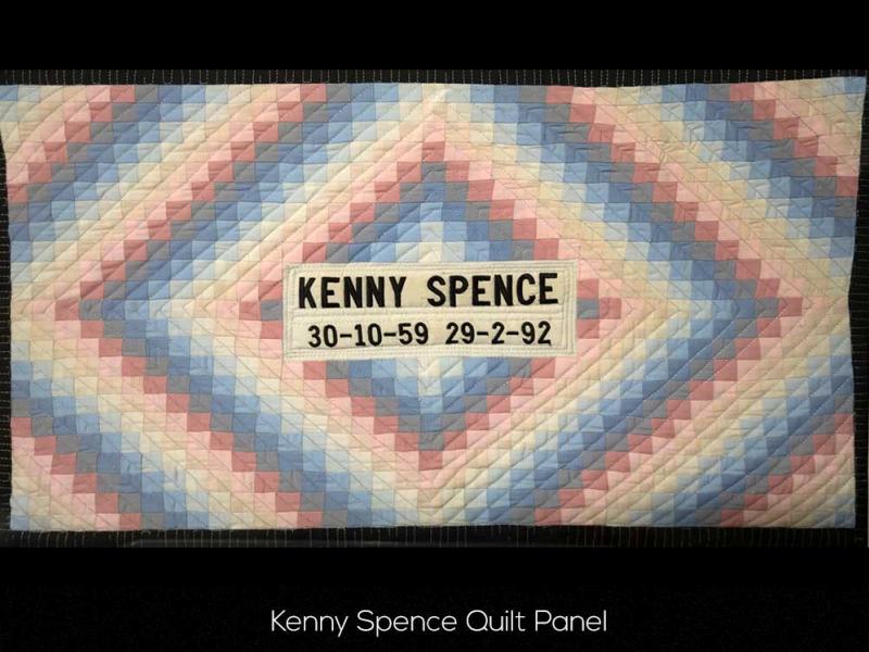 A quilt with the name kenny spence on it