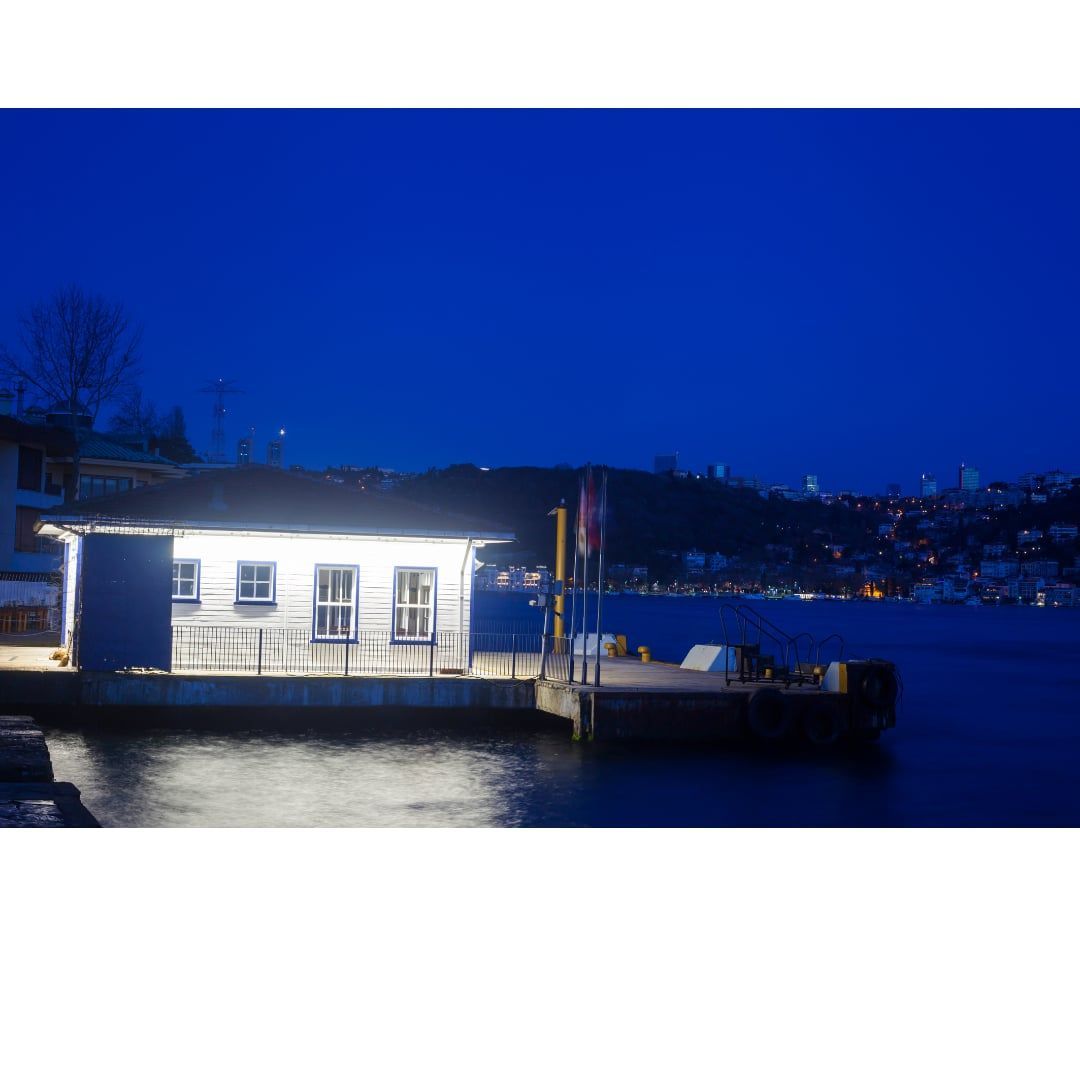 Permanent Holiday/accent lighting on boat house. St.Lawrence Luxury Lighting powered by Celebright.