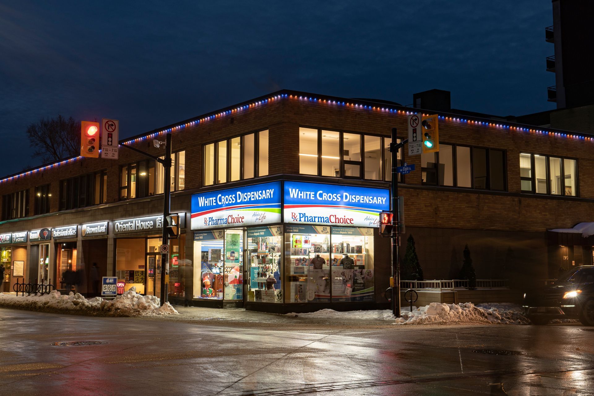 A building with a sign that says ' we 're open ' on it