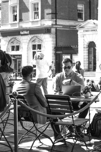People eating outside the restaurant