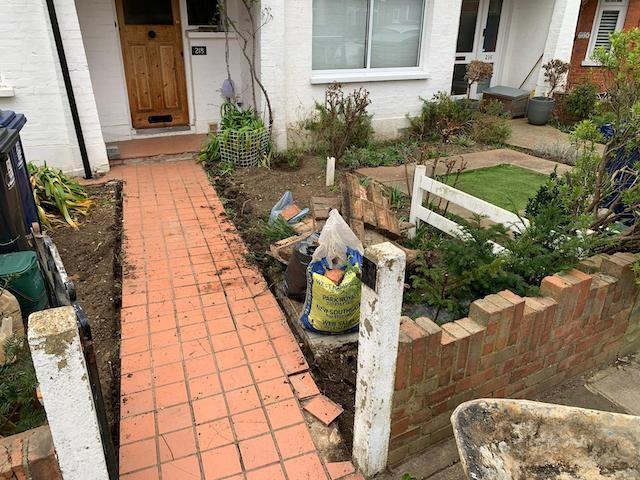 Old garden path being removed