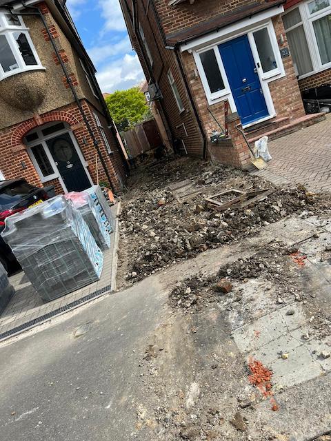 Old driveway being removed