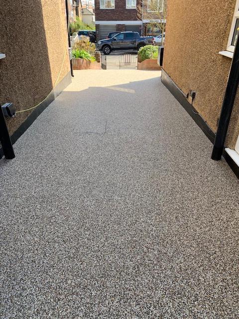 Share access resin installtion by West London Paving Ealing