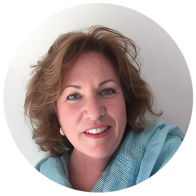 Woman with curly auburn hair smiles, wearing a turquoise scarf.