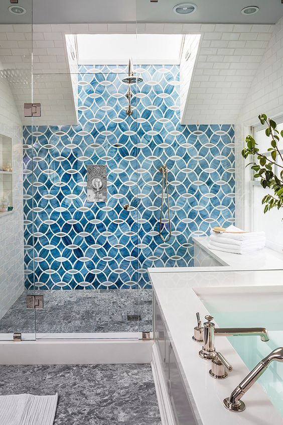 UK bathroom with creative geometric blue wall tiling