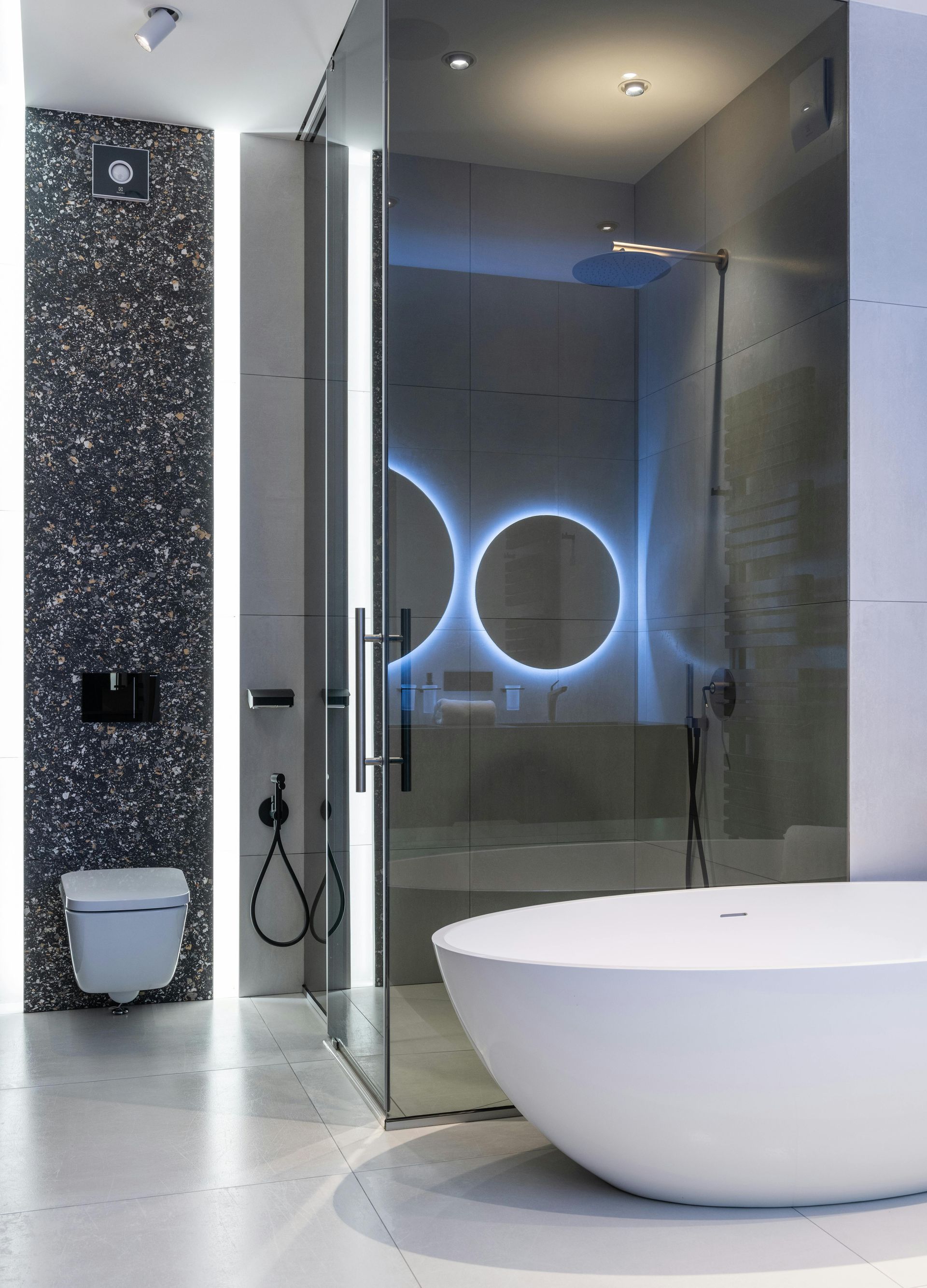 A modern, chic, luxurious and spacious bathroom in Newport, South Wales. Expertly tiled by Orchid Tiling