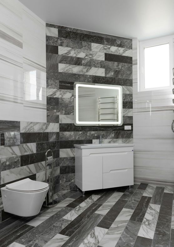 Lovely monochrome grey and black tiled modern bathroom