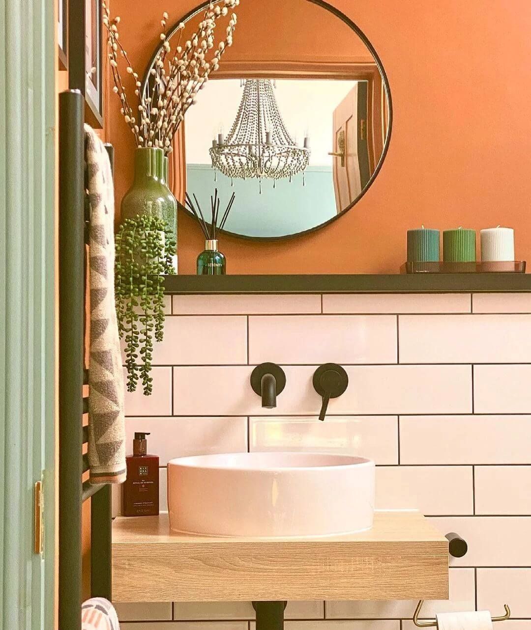 Colourful tiled bathroom in red, blue and green