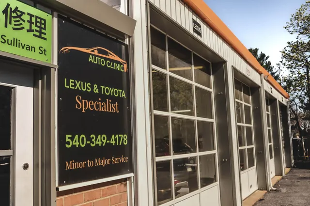 Exterior of Doc Auto Clinic: building with garage doors | Ish Auto Clinic