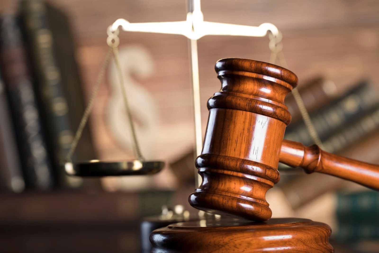 A gavel and a sign that reads
