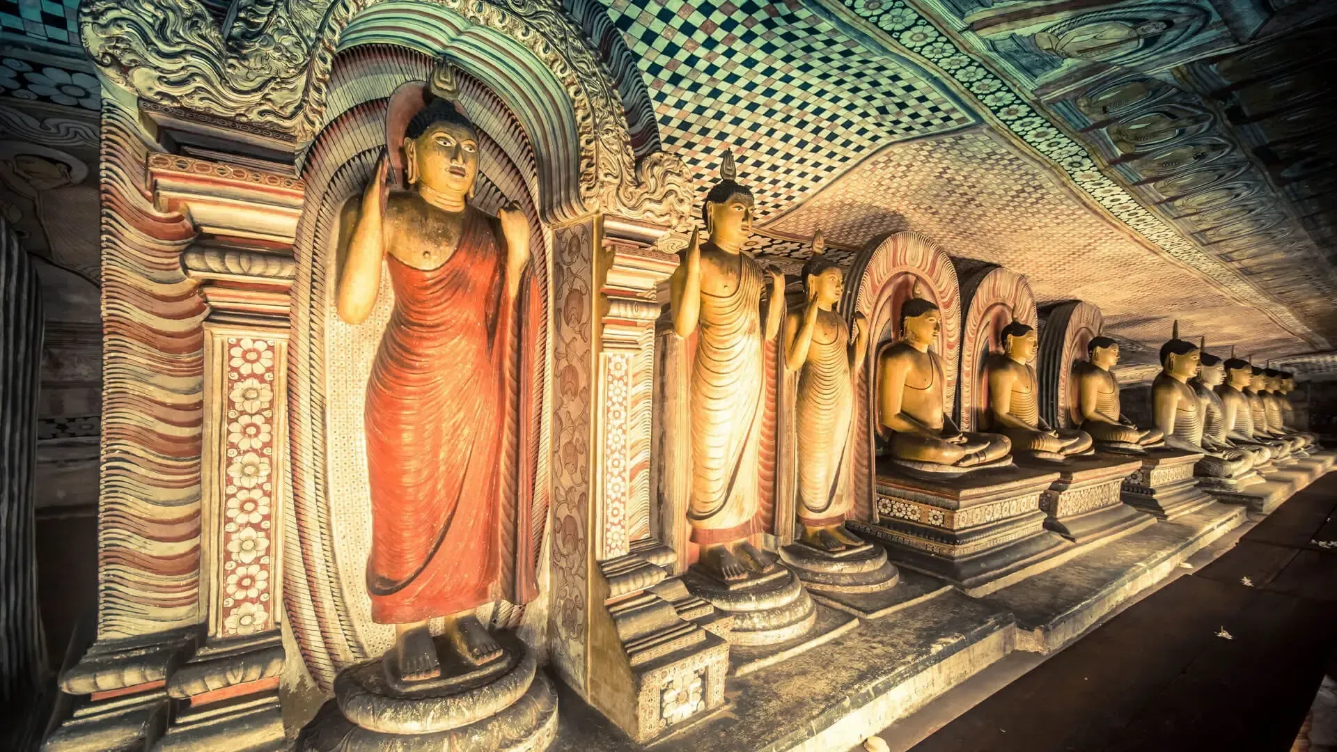 Visitors-exploring-Dambulla-Cave-Temple-caves-Sri-Lanka